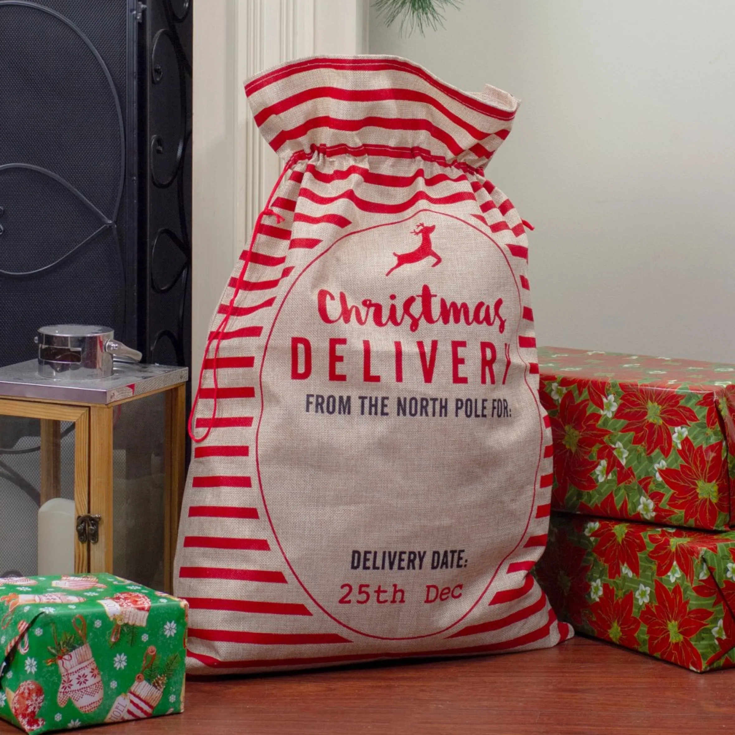 27" Beige And Red Striped "Christmas Delivery" Tie Gift Bag
