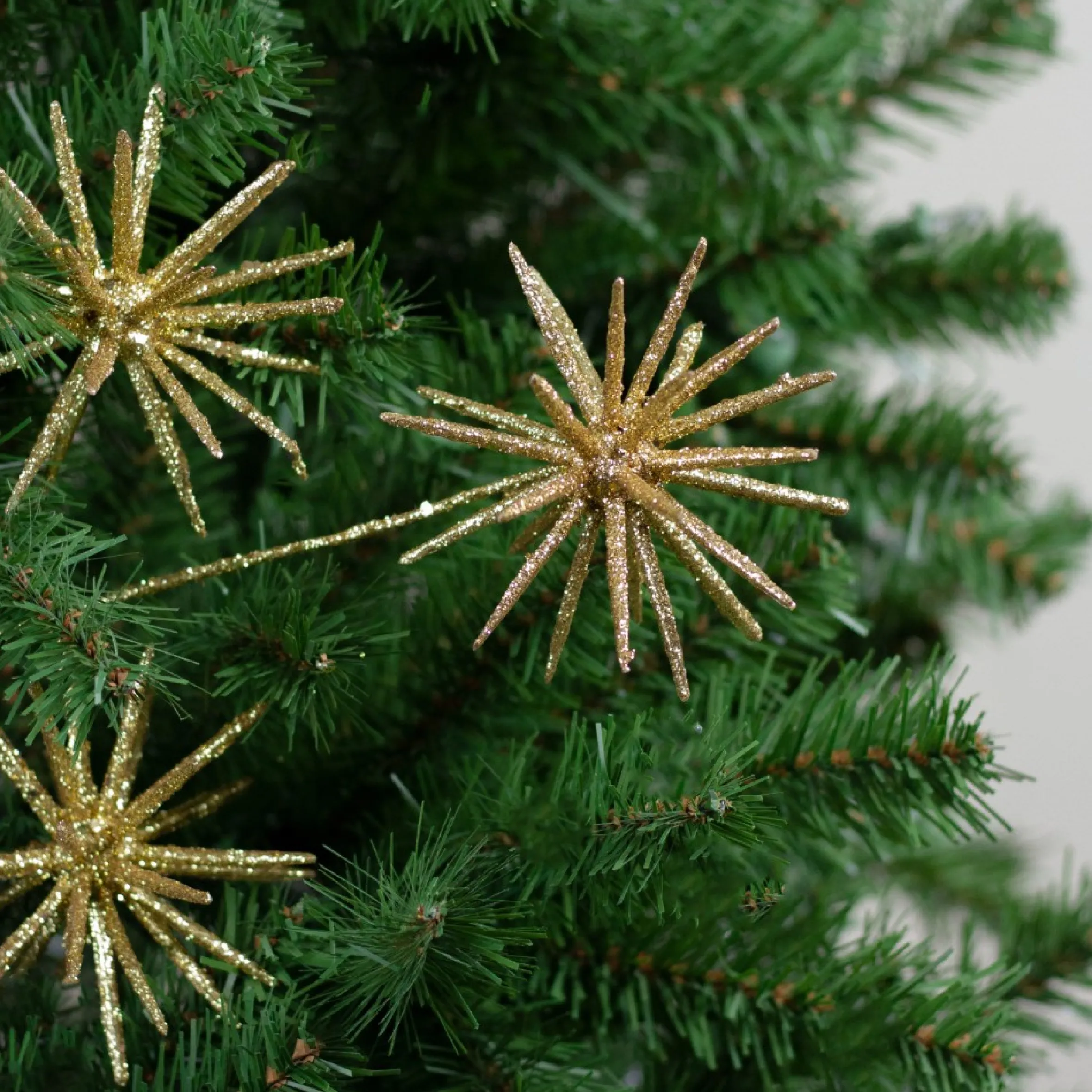 24" Gold Glittered And Shiny Starburst Artificial Christmas Spray