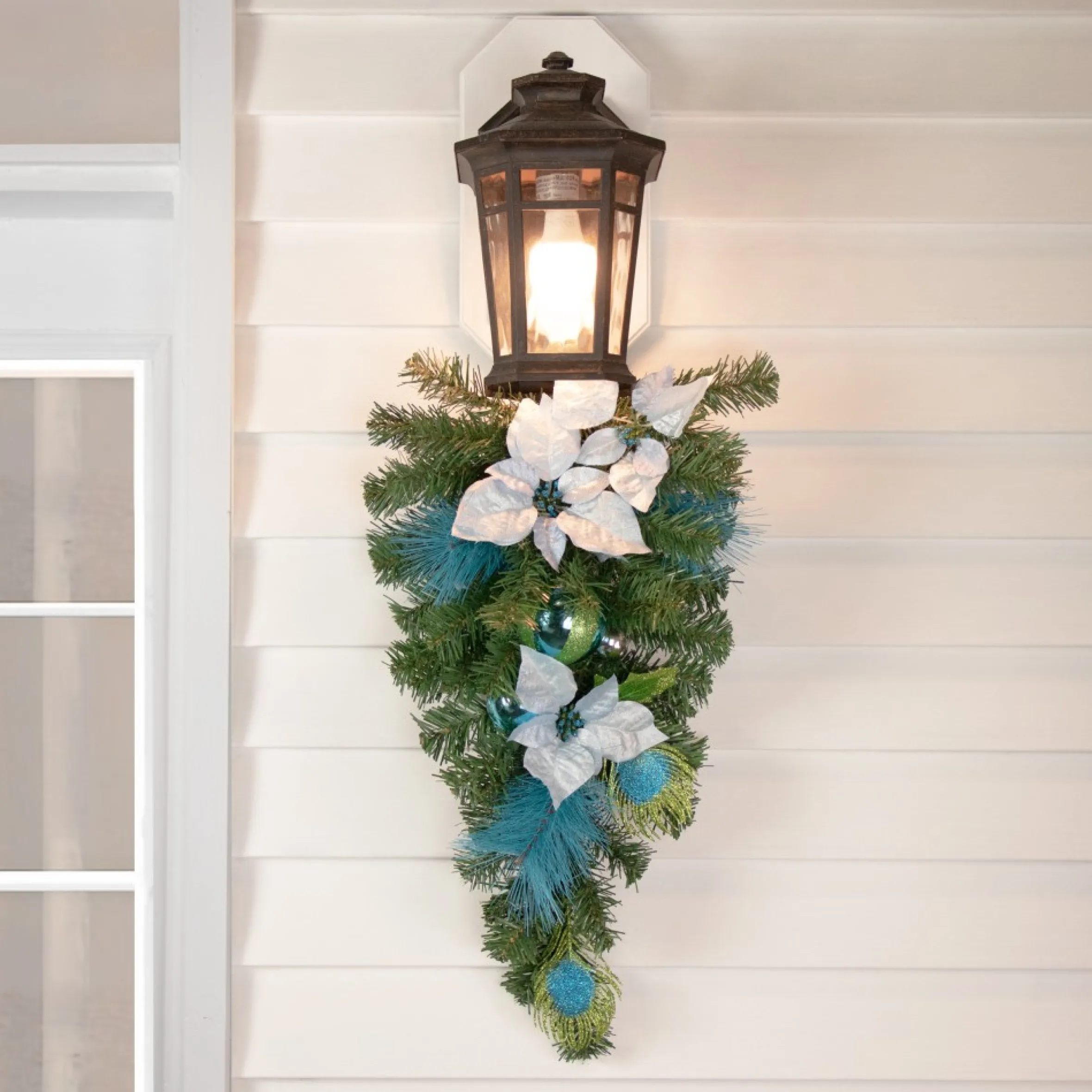 22" Peacock Feather And Poinsettia Artificial Christmas Teardrop Swag, Unlit