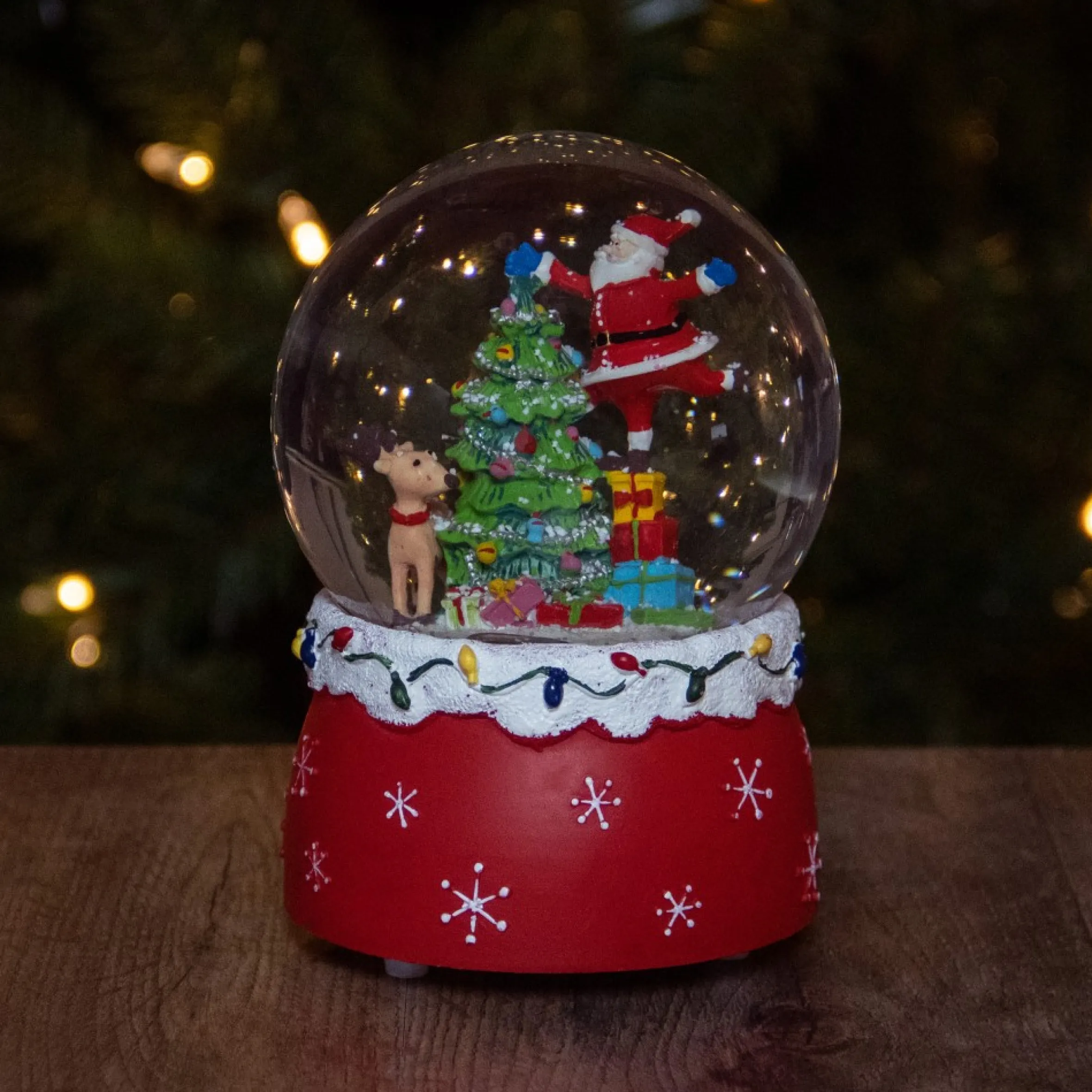 5.75" Santa Decorating A Christmas Tree Musical Snow Globe